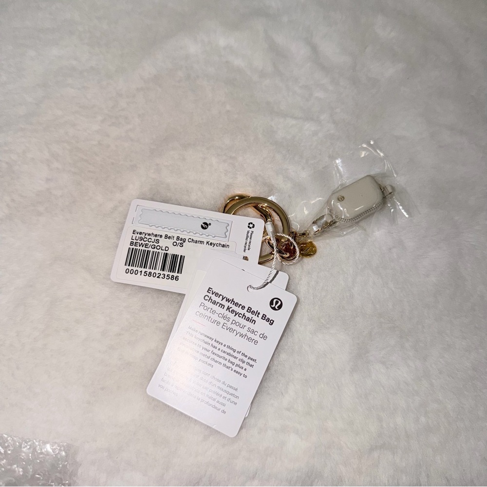 Lululemon Everywhere Belt Bag Charm Gold and Cream Keychain - Picture 5 of 5